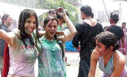 Indian femmes playing holy