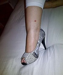 My Curvaceous Brazilian Wifey wearing a taut white suplex