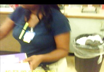 Dark-Hued Cashier Doll