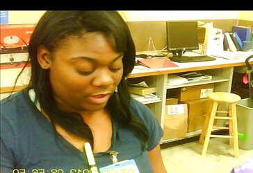 Dark-Hued Cashier Doll