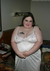 Kaylee in white glide with dark-hued pantyhose