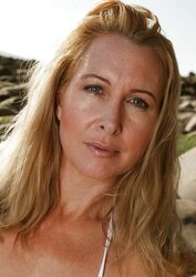 Mature hoes in g-string on beach