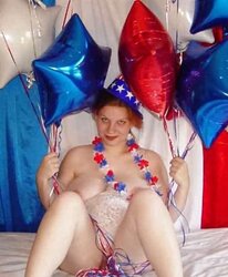 Pregnant redhead in white crimson and blue