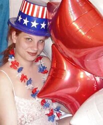Pregnant redhead in white crimson and blue