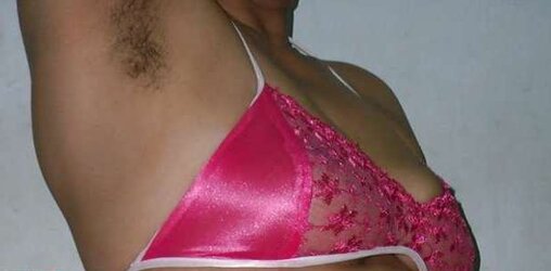 Indian mummy in net brassiere and wire thong
