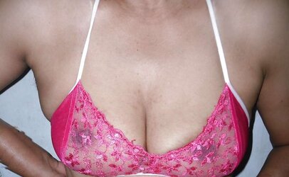 Indian mummy in net brassiere and wire thong