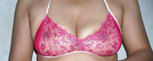 Indian mummy in net brassiere and wire thong