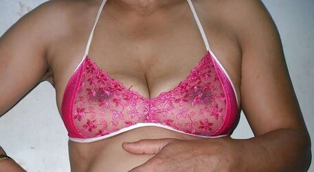 Indian mummy in net brassiere and wire thong