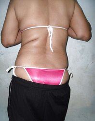 Indian mummy in net brassiere and wire thong