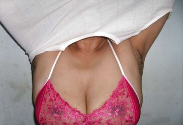 Indian mummy in net brassiere and wire thong