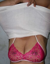 Indian mummy in net brassiere and wire thong