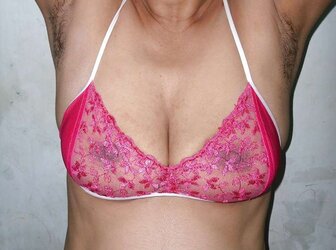 Indian mummy in net brassiere and wire thong