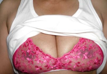 Indian mummy in net brassiere and wire thong
