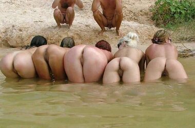 People being people bare on the beach