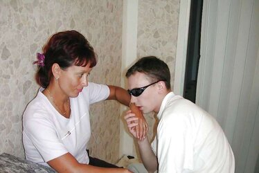 Russian mom Amalia with her son in the kitchen