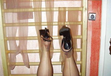 Her uber-cute gams and soles in nylons