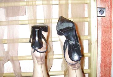 Her uber-cute gams and soles in nylons