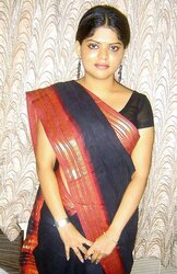 Neha nair in Ebony Saree bare photos