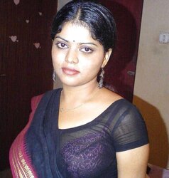 Neha nair in Ebony Saree bare photos