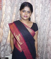 Neha nair in Ebony Saree bare photos