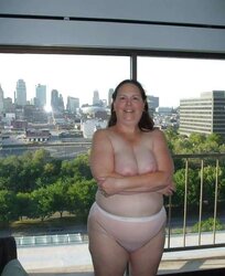 Mature duo revealing themselves from hotel