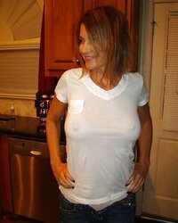 Erected nips through half-shirt ....