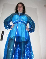 Wifey in girdle and PVC Raincoat