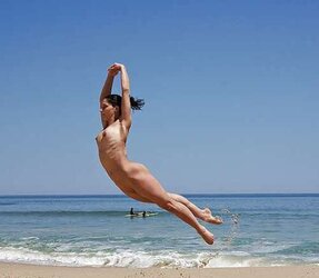 Bright side of nudism on beach