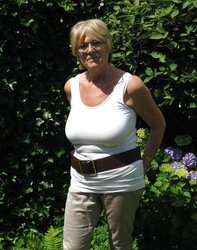 Housewife demonstrating her fabulous bra-stuffers