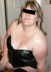 Naughtynursie ebony leather basque and highly brief micro-skirt