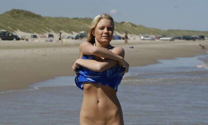 Lovely blondie liking her holiday posing bare