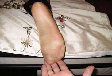 Chains and sunkissed pantyhose
