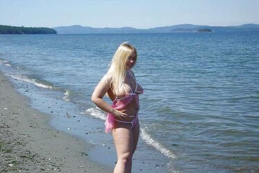 Chubby towheaded heads to the beach in a pinkish nightie