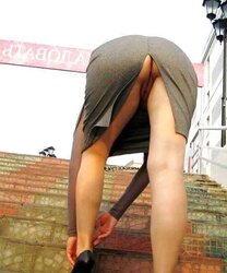Wives Upskirts And Showcasing Slit