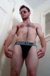 Youthfull unshaved swimmer