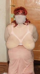 Gimp gal in restrain bondage