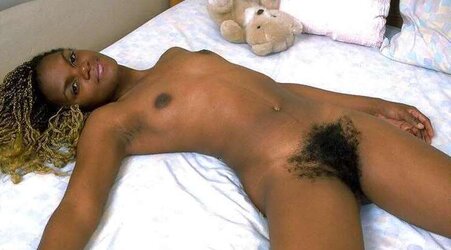 Dark-Hued bombshell with highly fur covered vagina