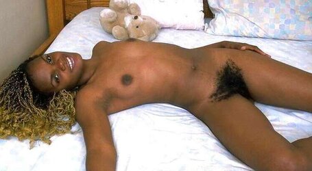 Dark-Hued bombshell with highly fur covered vagina