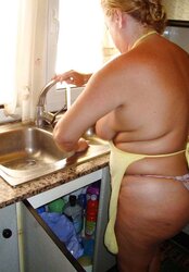 A wonderful mature dame in the kitchen