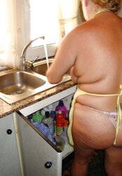 A wonderful mature dame in the kitchen