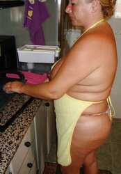 A wonderful mature dame in the kitchen