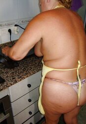 A wonderful mature dame in the kitchen