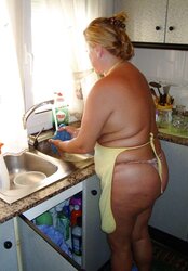 A wonderful mature dame in the kitchen