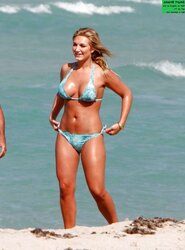 Celeb Brooke Hogan demonstrates enormous Titties at beach