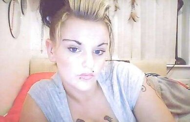 Buxomy tattoo doll. good assets.