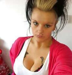 Buxomy tattoo doll. good assets.