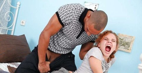 Teenager redhead raunchy penetrated by a dark-hued dude