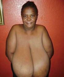 DARK-HUED GRANNY DISPLAY HER GIGANTIC TITS