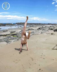 Furry inexperienced hotty stretching her gams at the beach