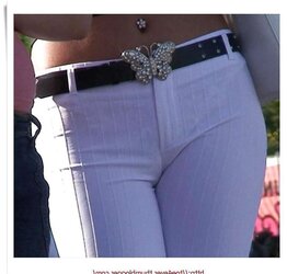 Walking with her cameltoe draping out